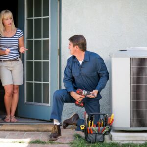 man installing air conditioner