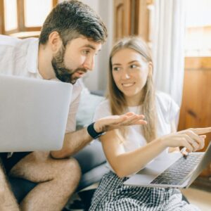 img of a couple looking at a computer